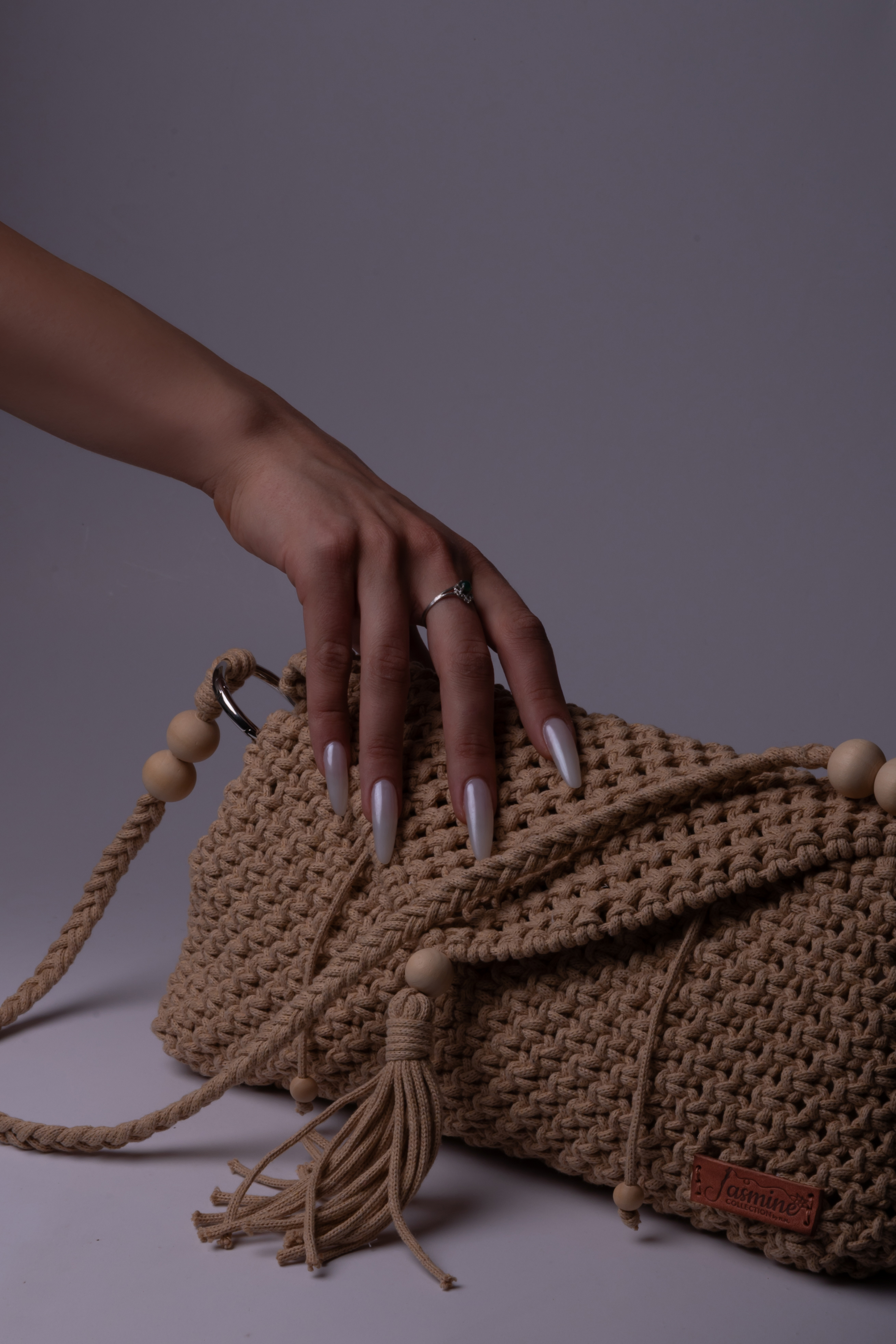 Close detail of hardware and stitching.